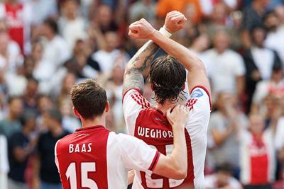 Weghorst opent de score en maakt zijn bekende gebaar. © Pro Shots