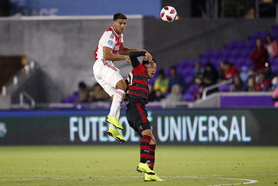 ORLANDO, 10-01-2019 , Orlando City Stadium, Flamengo player Uribe and Ajax player Lisandro Magallan during the Florida Cup game Ajax - Flamengo .