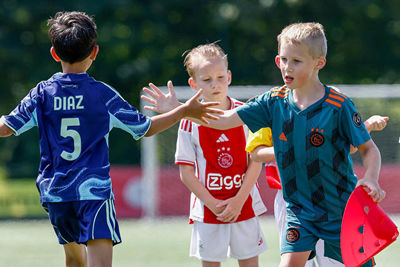 Samenwerken hoort ook bij de Ajax Kids Tour. © Pro Shots